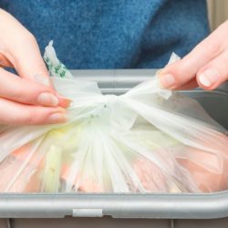 How should food worker deter pests from outdoor dumpsters